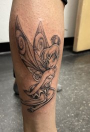 Tinker bell tattoo on leg.