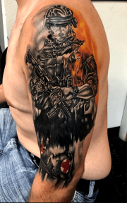 soldier with flames coming off shoulders with red cross helmet at bottom of arm, based off Battlefield game art, done By Don at art in motion tattoos.