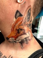 fox head tattoo on left side of the neck.