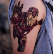 Realistic ironman Tattoo on top upper arm, full color, Done at Art In Motion Tattoos.