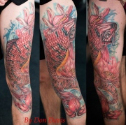 Koi tattoo sleeve on leg, black and red with flower, in colorado springs.