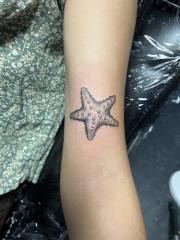 Starfish-done-in-dot-work-on-arm