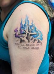 Watercolor mountain tattoo
