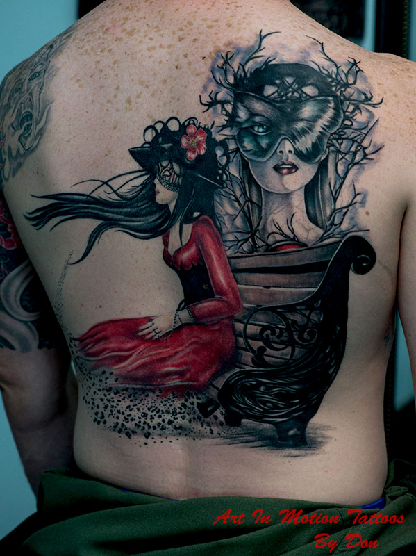 Natalie Shau Inspired Tattoo, Amazing artist, Women Sitting On Park bench disintegrating with Butterfly Masked Women Head behind bench. Done in Colorado Springs Tattoo Shop Art In Motion