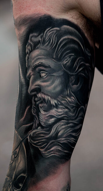 Black and Gray Tattoos Colorado Springs, Of Zeus under the arm.