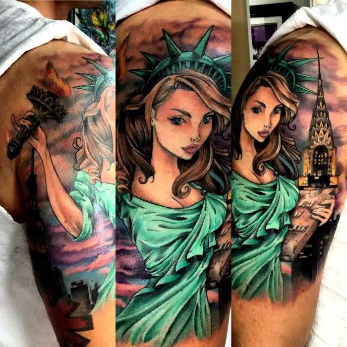 Statue of liberty tattoo in custom full color , done at the shop art in motion tattoos in colorado springs colorado.