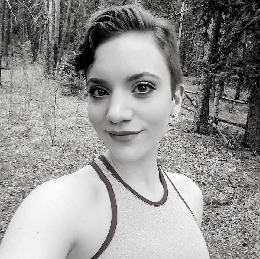 Headshot of tattoo artist samantha burton from Art In Motion Tattoos in Colorado Springs, CO