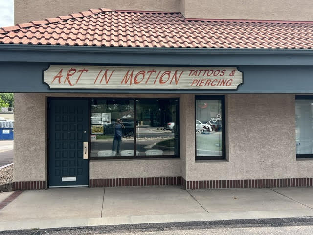 Front of Art in Motion Tattoos shop in Colorado springs