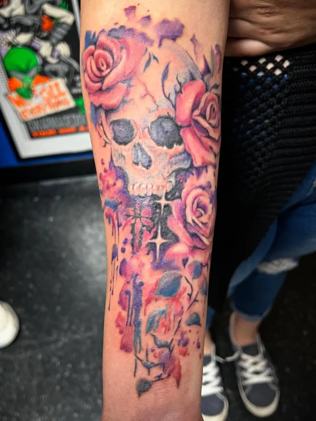 Skull and roses with watercolor by Mark at Art In Motion Tattoos.  #artinmotion #artinmotiontattoostudio #coloradospringstattooartist #skulltattoos #skullandroses #watercolor #watercolortattoo
